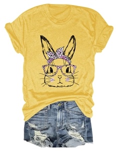Detail of yellow cotton t-shirt with leopard bunny print and frayed denim shorts