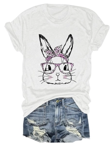 Flat lay of women's white rabbit print T-shirt with frayed denim shorts summer set
