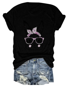 Detail of casual black t-shirt with pink leopard rabbit print and distressed denim shorts