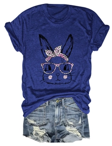 Detail of royal blue rabbit print t-shirt and distressed denim shorts set
