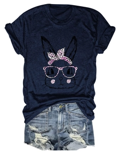 Close-up of short sleeve t-shirt with cute rabbit print and distressed denim shorts