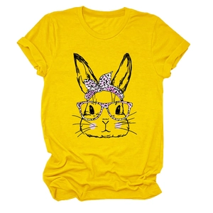 Detail view of cotton yellow t-shirt featuring a cute hand-drawn rabbit with pink leopard bow