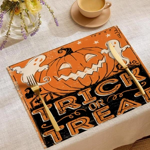 Detail von Halloween-Tischset aus Leinen mit Kürbis-Motiv und Trick-or-Treat-Schrift