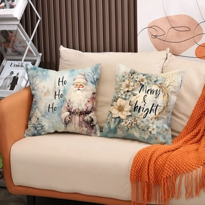 Minimalist Christmas pillow covers with Santa and winter wreath on a beige sofa