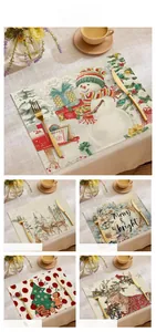 Détail du set de table en lin de Noël avec imprimés de rennes et bonshommes de neige