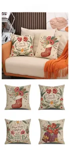 Detail of four rustic Christmas pillow covers with festive floral and pinecone patterns