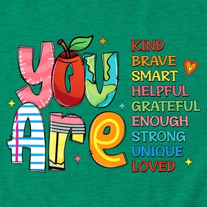 Close-up of You Are Kind Brave slogan print on green cotton fabric short sleeve T-shirt