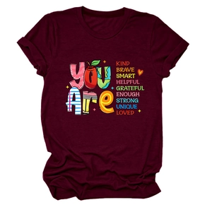 Detail of burgundy t-shirt with You Are Kind Brave Smart colorful inspirational text