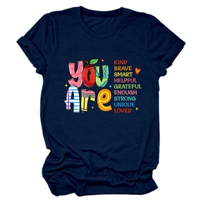 Detailed view of Navy Blue t-shirt fabric featuring colorful You Are Kind Brave lettering