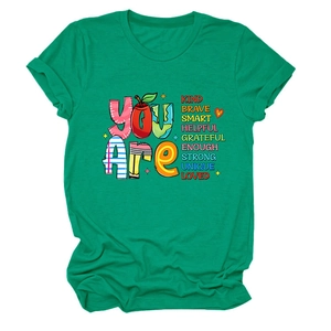 Close-up of inspirational colorful typography on green cotton round neck t-shirt