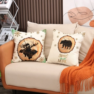 Linen sofa pillow covers with forest animal silhouettes and festive snowflake patterns