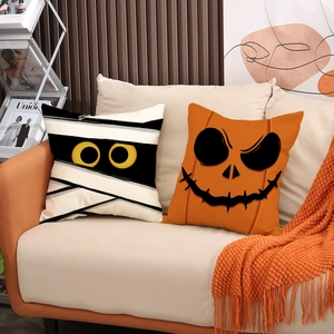Halloween decorative pillowcases set with mummy and orange pumpkin ghost patterns on sofa