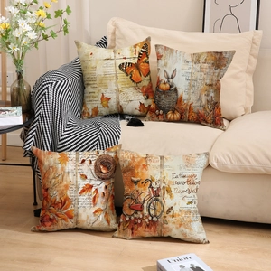 Set of four autumn linen pillow covers featuring vintage pumpkin and maple leaf prints