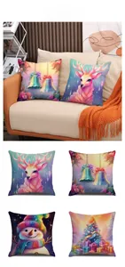 Detailed view of four colorful Christmas pillow covers with reindeer and snowman prints