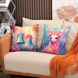 Christmas cartoon pillowcase set with colorful elk and bells patterns on a sofa