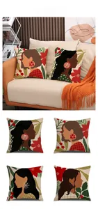 Detail of artistic linen pillow covers featuring modern female portraits and floral motifs