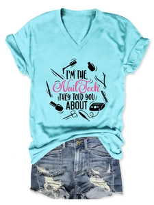 Detail of V-neck light blue T-shirt with nail tech graphic print and breathable cotton fabric