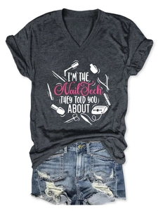 Detail of grey V-neck T-shirt with 'Nail Tech' slogan and ripped denim shorts set