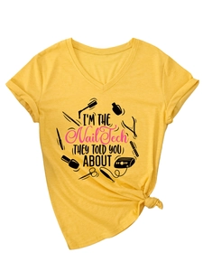 Detail of V-neck T-shirt with 'Nail Tech' print and a knotted hem design on yellow fabric