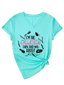 Detail of mint V-neck T-shirt showing nail tech print and stylish side knot design