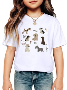 Détail du t-shirt blanc en coton pour enfants avec divers motifs de chiens de dessin animé
