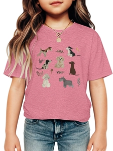 Détail du t-shirt rose pour enfant avec motifs de chiens de dessin animé et fleurs