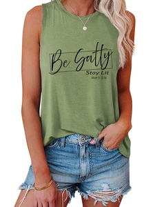 Detail of olive green tank top with Be Salty Stay Lit Matt 5:13-14 text and denim shorts