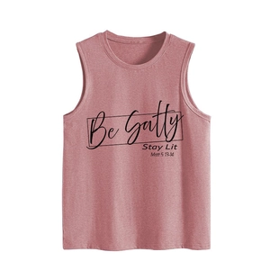 Detailed close-up of pink knit tank top featuring Be Salty Stay Lit printed text