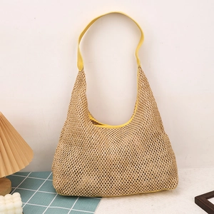 Beige woven hollow hobo shoulder bag with vibrant yellow leather strap for summer