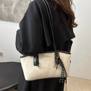 Retro contrast tote bag in cream and black suede with elegant shoulder straps