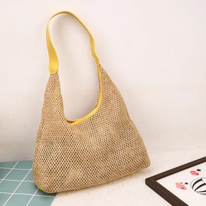 Large woven straw shoulder bag with yellow leather trim for summer beach travel