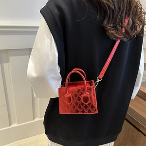 Fashionable red metallic quilted crossbody bag for women with elegant gold hardware
