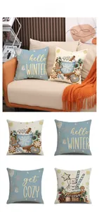 Detail showing four Christmas linen pillowcases with snowman and gingerbread prints