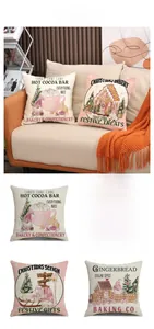 Detailed view of four pink Christmas linen pillow covers with holiday illustrations
