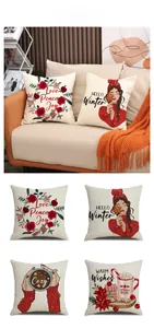 Detail of four Nordic Christmas linen pillow covers with festive floral and cozy patterns