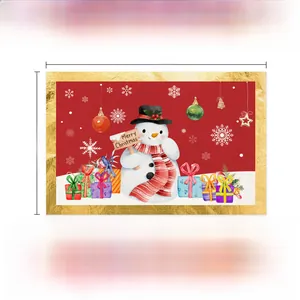 Dettaglio della tovaglietta natalizia in lino con motivo pupazzo di neve e dimensioni 45x30cm