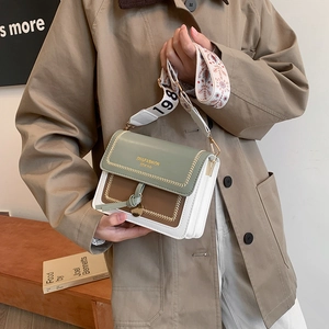 Fashion square crossbody bag with green flap and colorful ethnic wide strap in street style