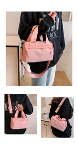 Detail view showing versatile carrying options of this lightweight pink nylon sports bag