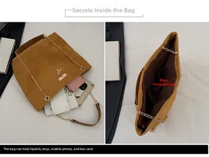 Detail view of large capacity interior for brown tote bag with gold chain strap
