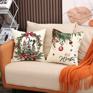 Housses de coussin de Noël avec motifs Joy et Hello Winter sur tissu en lin beige