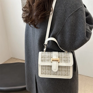 French style tweed crossbody bag in cream and gold with white leather trim and metal clasp