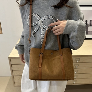 Retro brown suede bucket tote bag with adjustable handles and crossbody strap