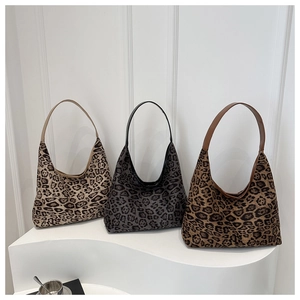 Detailed view of leopard print hobo bags in three colors with premium suede texture