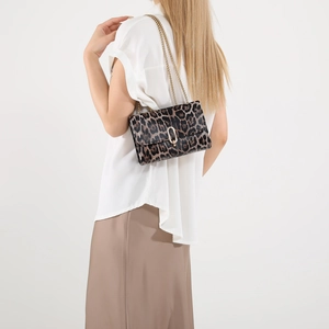 Chic leopard print crossbody bag with gold chain strap and elegant metal clasp for women