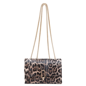Leopard print crossbody bag with gold chain strap and U-shaped metal buckle buckle detail