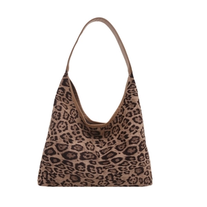 Chic leopard print canvas tote bag with brown faux leather straps for women on white background