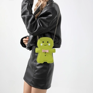 Borsa a tracolla omino di pan di zenzero in ecopelle verde chiaro con catena in metallo