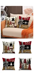 Set of four Christmas pillow covers with reindeer and festive trees in cozy home setting