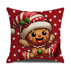 Weihnachtlicher Kissenbezug in Rot mit Lebkuchenmann und weißen Punkten für das Sofa
