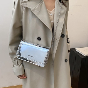 Minimalist silver mirror crossbody bag with metal chain strap and rectangle flap design